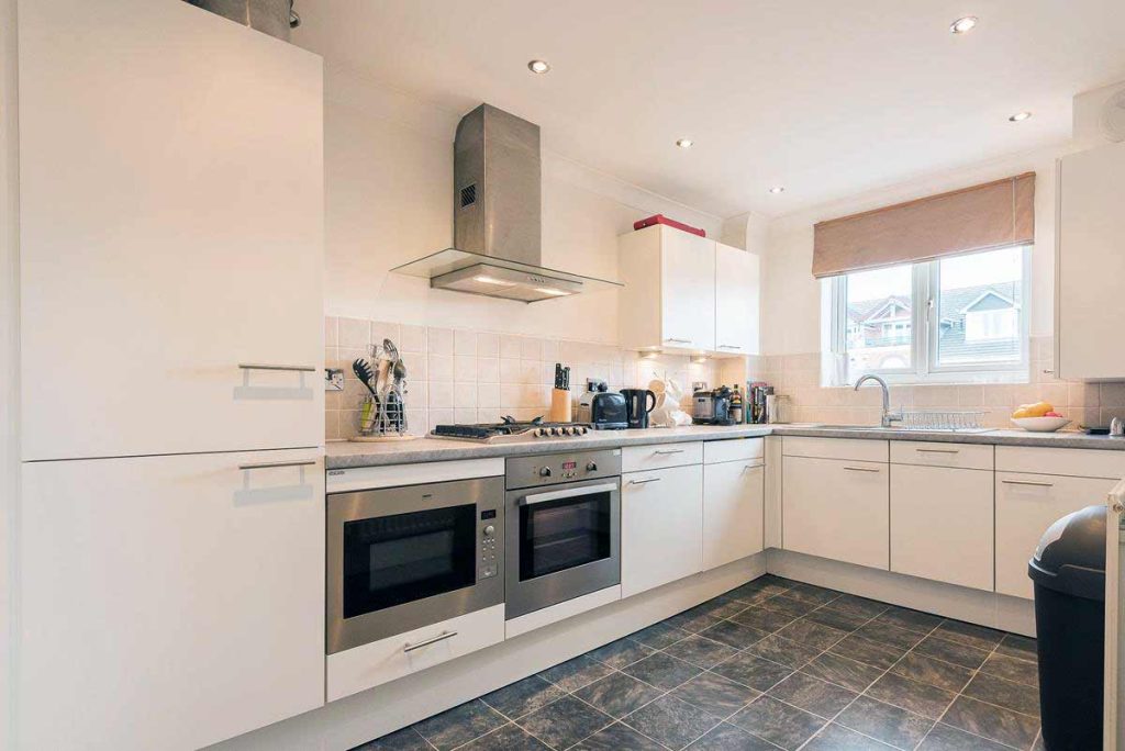 A communal kitchen in a Namas Property Management property in Stoke